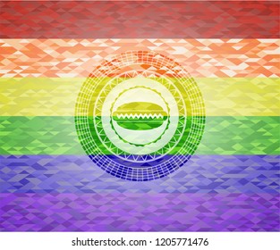 hot dog icon inside emblem on mosaic background with the colors of the LGBT flag