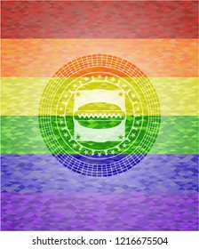 hot dog icon inside emblem on mosaic background with the colors of the LGBT flag