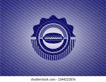 hot dog icon inside emblem with jean texture
