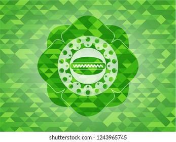 hot dog icon inside green emblem. Mosaic background