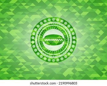 hot dog icon inside green mosaic emblem. 