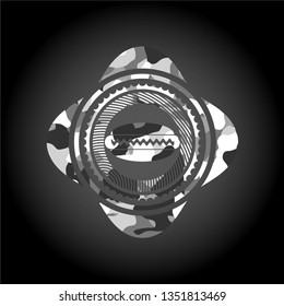 hot dog icon inside grey camo emblem