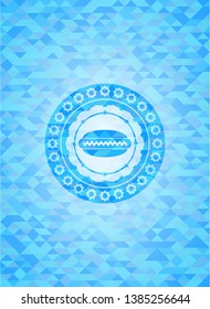 hot dog icon inside light blue mosaic emblem