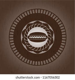 hot dog icon inside vintage wooden emblem