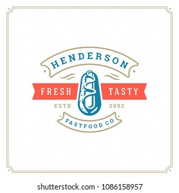 Hot dog logo design vector illustration. Hot dog sausage silhouette, good for restaurant menu and cafe badge. Vintage typography logotype template.