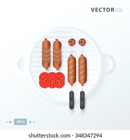Hot dogs and tomatoes on the grill