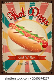 Hot dogs vintage restaurant sign. Fast food vintage poster. Retro design with big hamburger on old metal background red and turquoise colors. Wall decoration printing media. Vector EPS10 illustration.