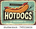 Hot dogs vintage tin sign idea. Retro sign with delicious hotdog and creative typo. Food vector comic style illustration for hot dogs snack bar or food truck.