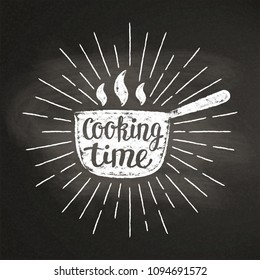 Hot pot chalk silhoutte with sun rays and lettering - Cooking time - on blackboard. Good for cooking logotypes, bades or posters.