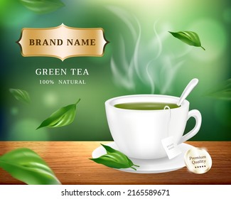 Hot tea advertisement. Realistic green tea ,cup, teabag and leaves  on the table with blurred background. Hot beverage banner design.