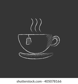Hot tea in cup. Drawn in chalk icon.