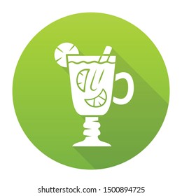 Hot toddy green flat design long shadow glyph icon. Hot whiskey in Irish coffee glass. Beverage with lemon slices and cinnamon stick in footed tumbler with handle. Vector silhouette illustration