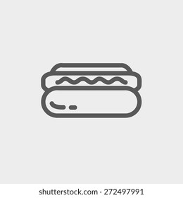 Hotdog sandwich icon thin line for web and mobile, modern minimalistic flat design.  Vector dark grey icon on light grey background.