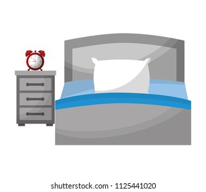 hotel bed and bedside table clock alarm