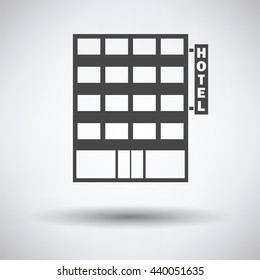 Hotel building icon on gray background with round shadow. Vector illustration.