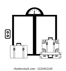 hotel elevator doors and suitcases