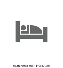 Hotel, lodgings simple glyph vector icon. Motel or hostel room black flat symbol. Man in bed stylized sign.