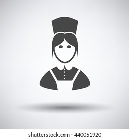 Hotel maid icon on gray background with round shadow. Vector illustration.