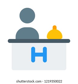 Hotel receptionist at desk
