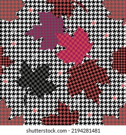 Hounds tooth pattern with red maple leaves.
