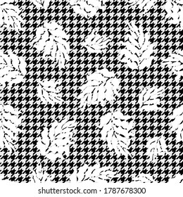 Hounds tooth print with leaves. Checkered pattern for autumn clothes. Template for scarves, coats, suits, shirts and home decorations.