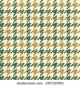 Houndstooth pattern autumn in green and gold. Seamless dog tooth background graphic for coat, jacket, bag, skirt, dress, gift wrapping, other modern fashion textile or paper design.