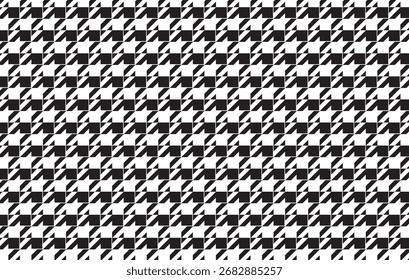 Houndstooth pattern repeats black and white shapes create a classic, timeless textile look, filling the frame with a structured, elegant feel.