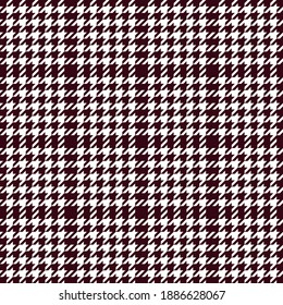 Houndstooth plaid pattern in black and white. Seamless tartan tweed checked plaid graphic for coat, skirt, jacket, or other modern spring, autumn, winter fashion textile design. Simple texture.