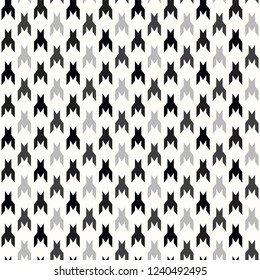 Hounds-tooth seamless vector pattern. Geometric print in black and white color . Classical English background Glen plaid Glenurquhart check for fashion design.