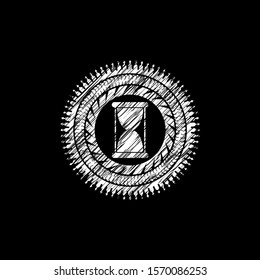 hourglass icon drawn on a blackboard