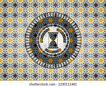 hourglass icon inside arabesque badge background. arabic decoration.