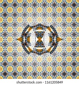 hourglass icon inside arabesque style badge. arabic decoration.