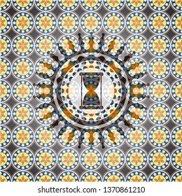 hourglass icon inside arabesque style badge. arabic decoration.