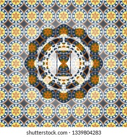 hourglass icon inside arabic emblem. Arabesque decoration.