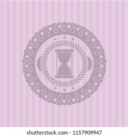 hourglass icon inside badge with pink background