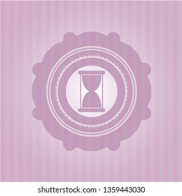 hourglass icon inside badge with pink background