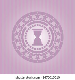 hourglass icon inside badge with pink background