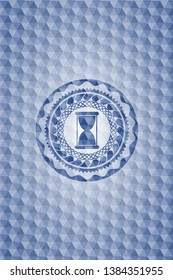 hourglass icon inside blue emblem or badge with abstract geometric pattern background.