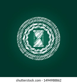 hourglass icon inside chalk emblem written on a blackboard
