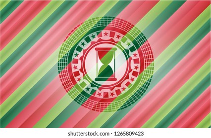 hourglass icon inside christmas colors emblem.