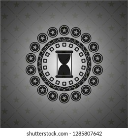 hourglass icon inside dark emblem. Retro