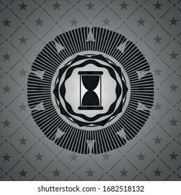 hourglass icon inside dark emblem. Retro