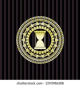 hourglass icon inside gold shiny emblem