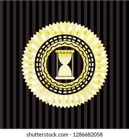 hourglass icon inside golden badge