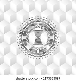 hourglass icon inside grey emblem with cube white background