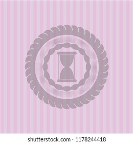 hourglass icon inside pink emblem. Vintage.