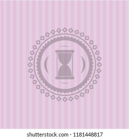 hourglass icon inside pink emblem. Vintage.