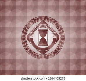 hourglass icon inside red seamless geometric badge.