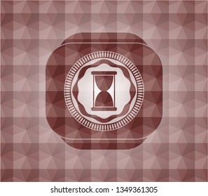 hourglass icon inside red seamless emblem with geometric pattern background.