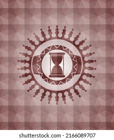 Stundenglas-Symbol in rotem, nahtlosem geometrischem Abzeichen. 